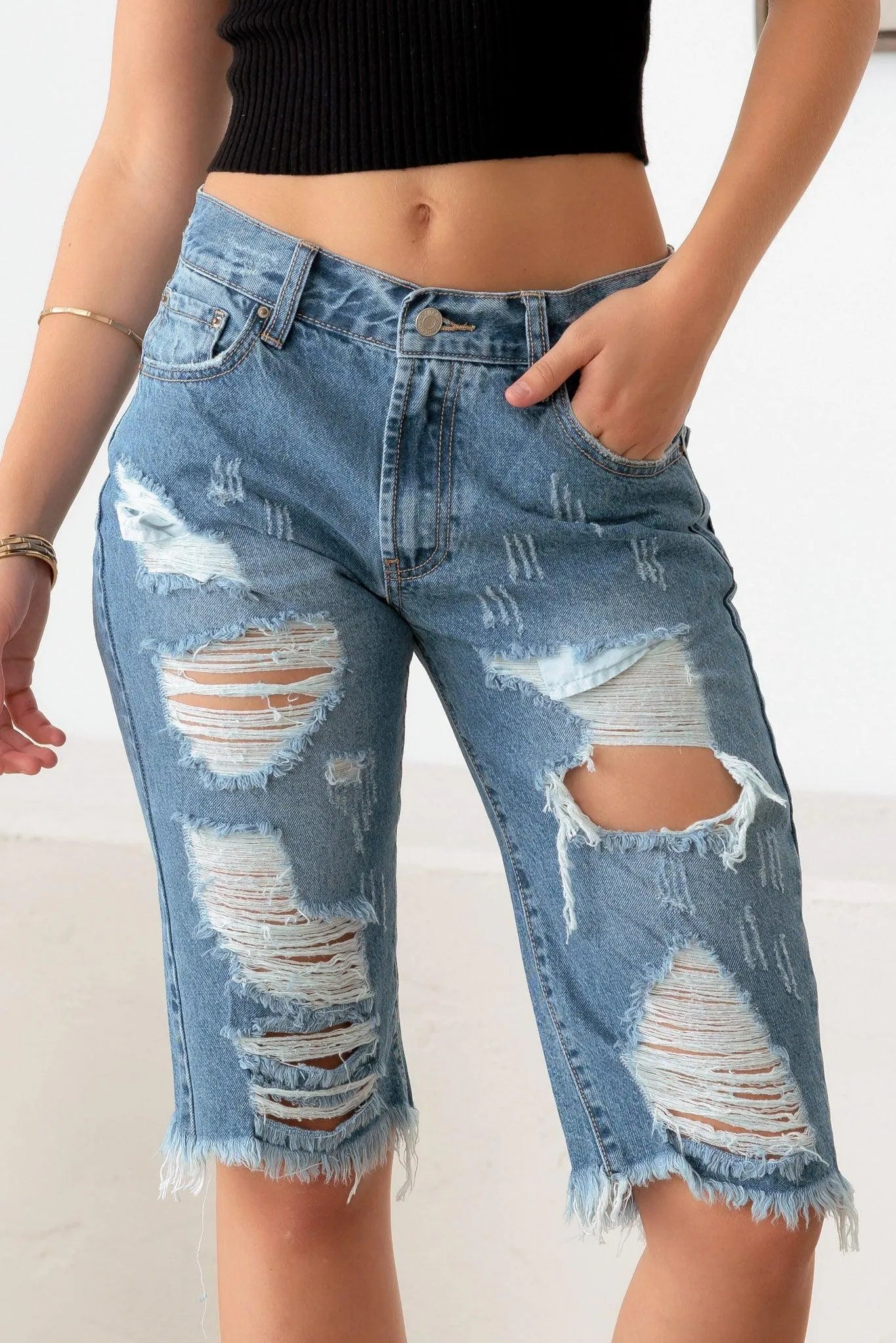 Ripped capris shorts online