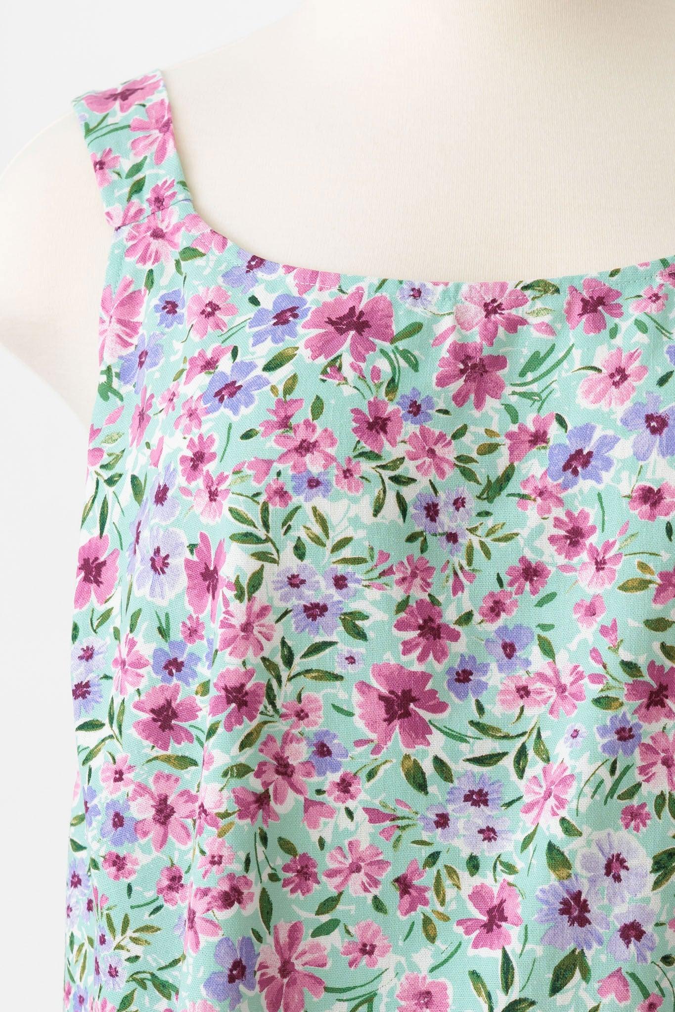 Plus Size Criss Cross Sleeveless Floral Top - Tasha Apparel Wholesale