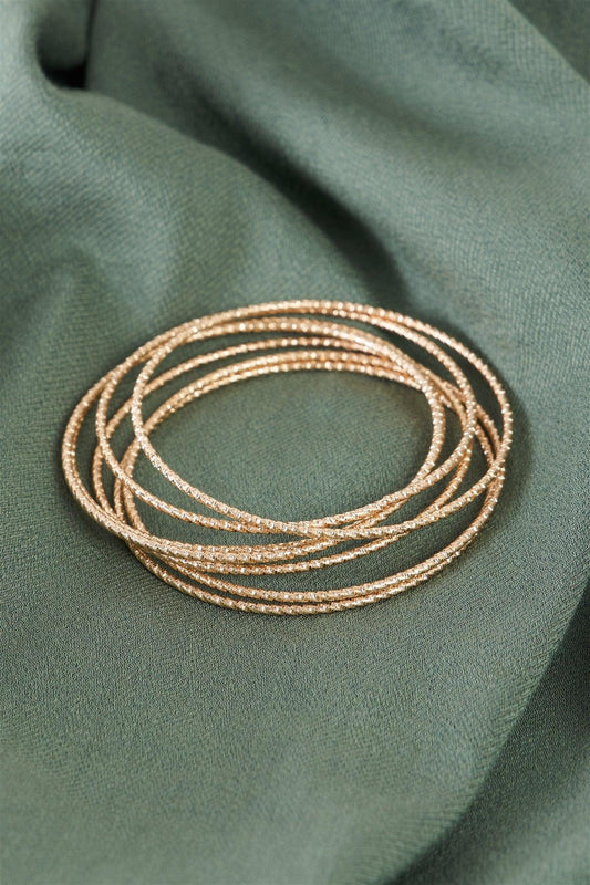 Gold Ribbed 7 Ring Bracelet /6 Pieces